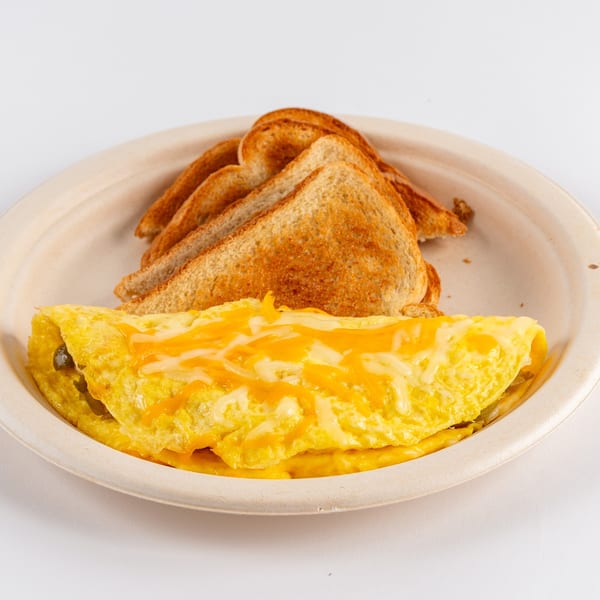 A cheesy omelet with a side of golden brown toast on a light-colored plate.